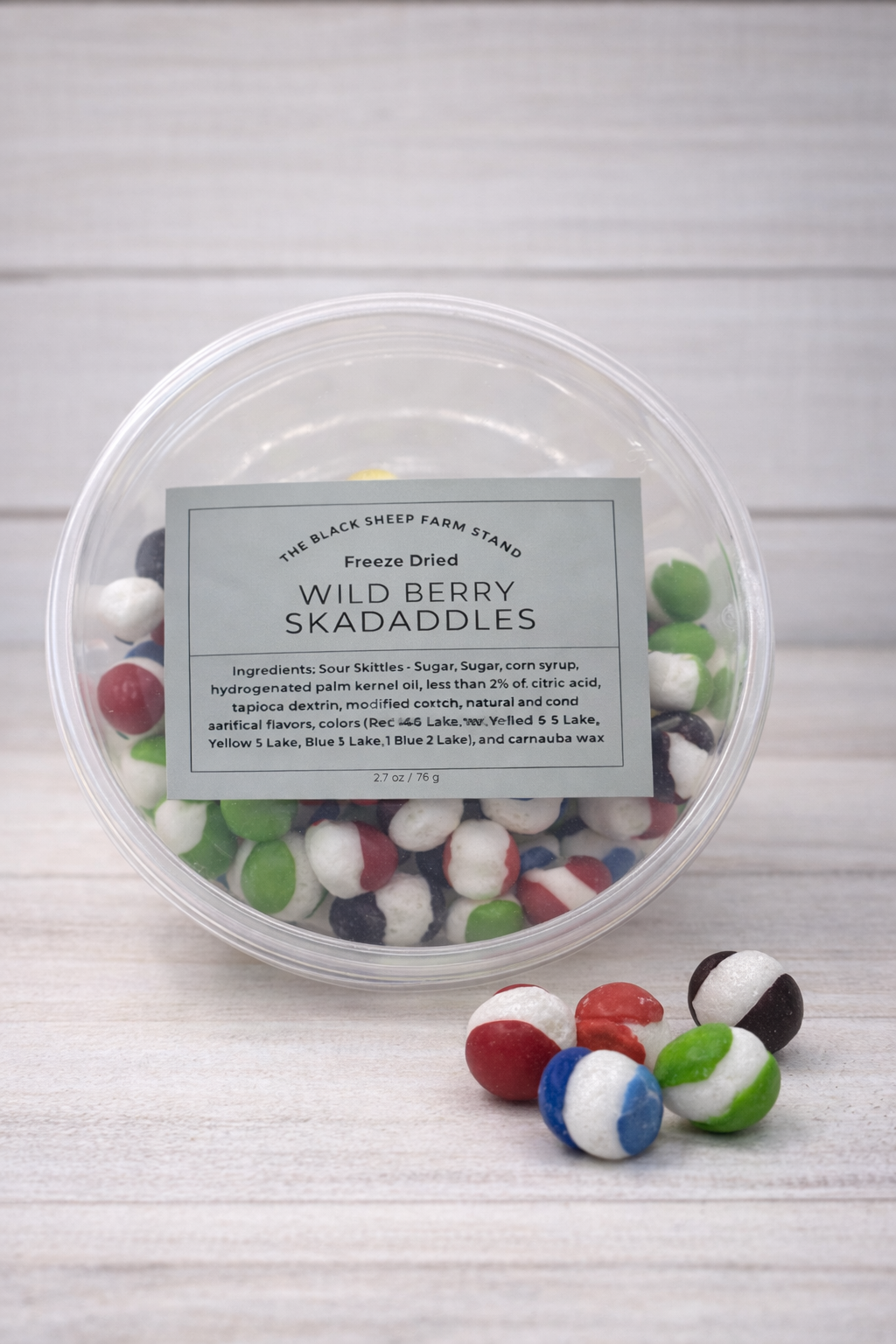 Container of Wild Berry Skadaddles with a label on a white background